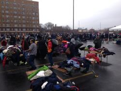 COPP event attendees collecting needed donated items