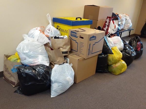 Donations collected for Planet Aid at the First Annual Charity Fair in Aurora, OH..
