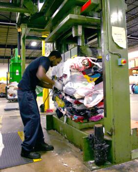 planet aid, baler, clothes, warehouse