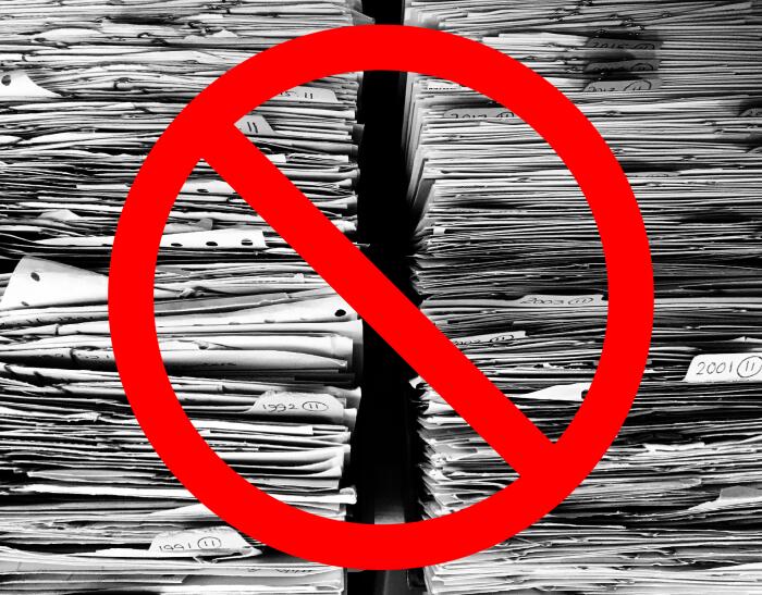 Stacks of paper crossed out