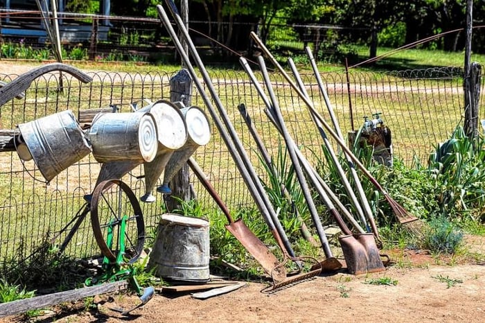metal garden tools and watering equipment
