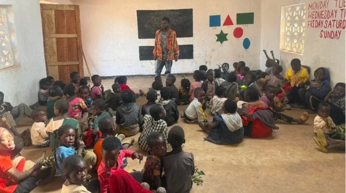 James teaching Education-–-the-road-towards-development....-how-does-it-look-in-Malawi-April -13 post