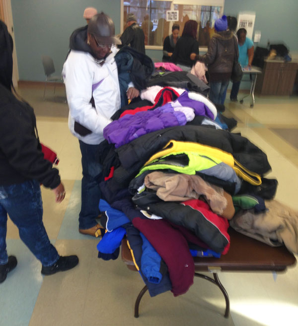 Aid Donates Coats During IBERO Event Aid, Inc.